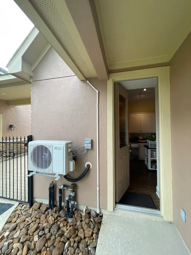 Ductless mini split outdoor unit installed at a Conroe home by LaFitte HVAC